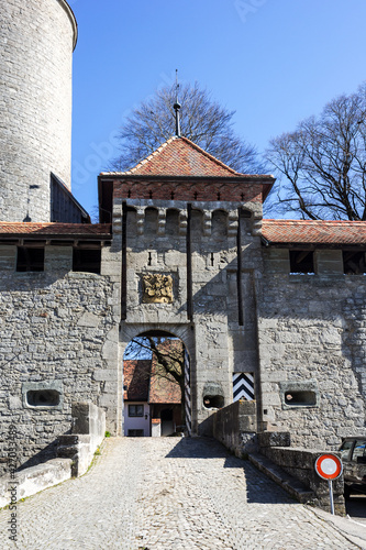 Romont, Switzerland - April 01.2021: Gate of the Castle Romont, built by Peter II of Savoy around 1240. Today it is a museum. Canton Freibourg, Switzerland photo