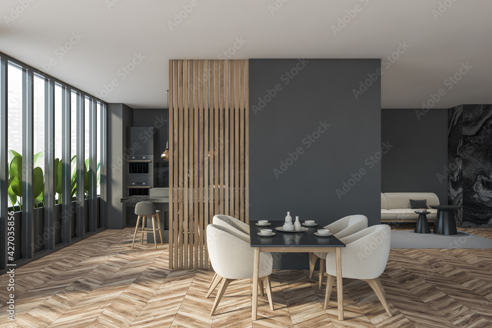 Dark modern dining room interior with panoramic window and partition ...