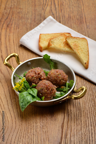 A plated dish of Ahi Tuna Tartar and toasted bread