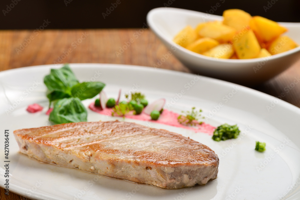 Healthy grilled tuna steak on the plate Healthy grilled tuna steak on the plate