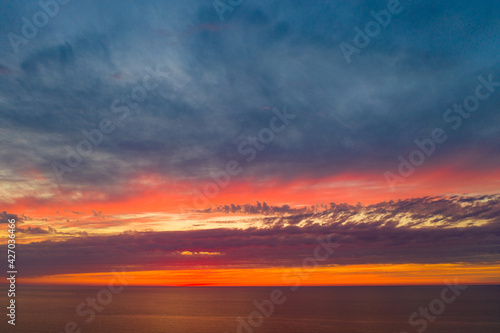 Beautiful orange sunset view from drone