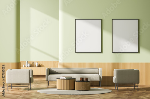 Fototapeta Naklejka Na Ścianę i Meble -  Living room interior with two white poster on green wall