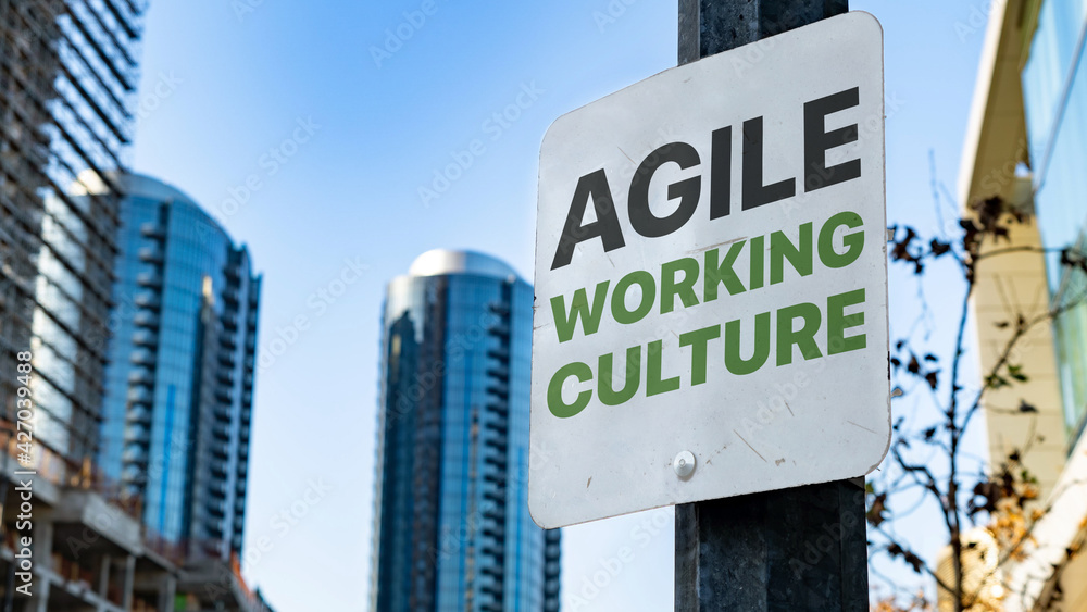 Agile Working Culture on Worn Sign in Downtown city setting Agile Working Culture on Worn Sign in Downtown city setting
