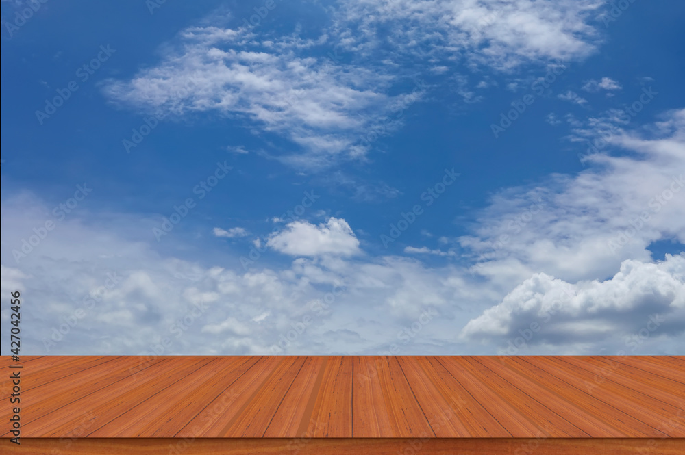 Wooden table with empty blue sky display advertisement background