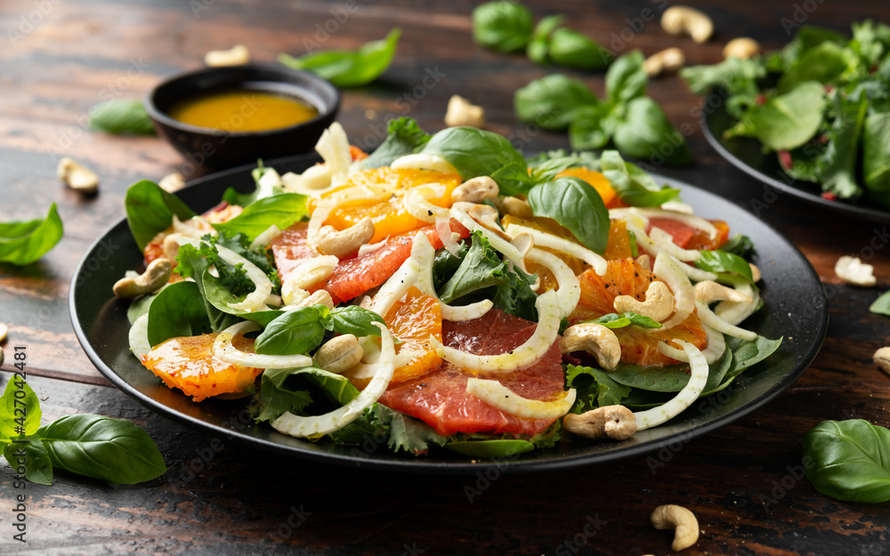 Fresh salad with fennel, orange, grapefruit, spinach and cashew nuts. healthy food. Fresh salad with fennel, orange, grapefruit, spinach and cashew nuts. healthy food.