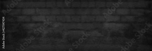 Panorama Black cement wall texture background for design in your work concept backdrop.
