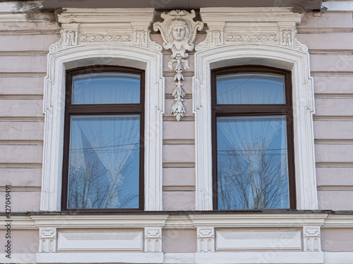Windows on old city facades  with decorative elements