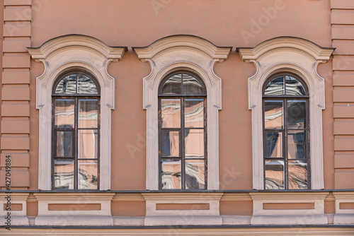 Windows on old city facades  with decorative elements