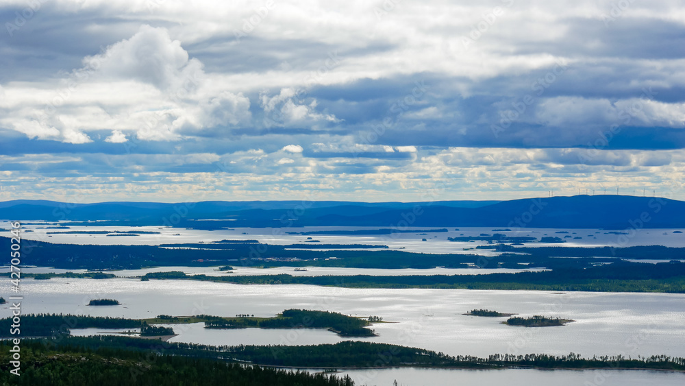 View from the highest point near Arjeplog in Sweden. This view is towards the lake Hornavan in Sweden, in Norrbotten County - Lapland. One of the many wetlands in Sweden.
