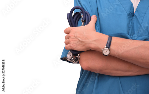 A doctor in a blue suit with stethoscopes in her hand. The torso of a female doctor