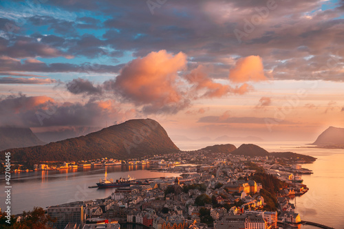 Alesund, Norway. Amazing Natural Bright Dramatic Sky In Red Colours Above Alesund Islands In Sunset Sunrise Time. Colorful Sky Background. Beauty In Norwegian Nature