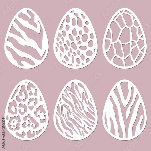 Patterns, spots, texture carved in egg. Vector illustration. Easter eggs for Easter holidays. Set of paper Easter egg stickers. Laser cut. Vector illustration. Pattern for the laser cut, plotter and s