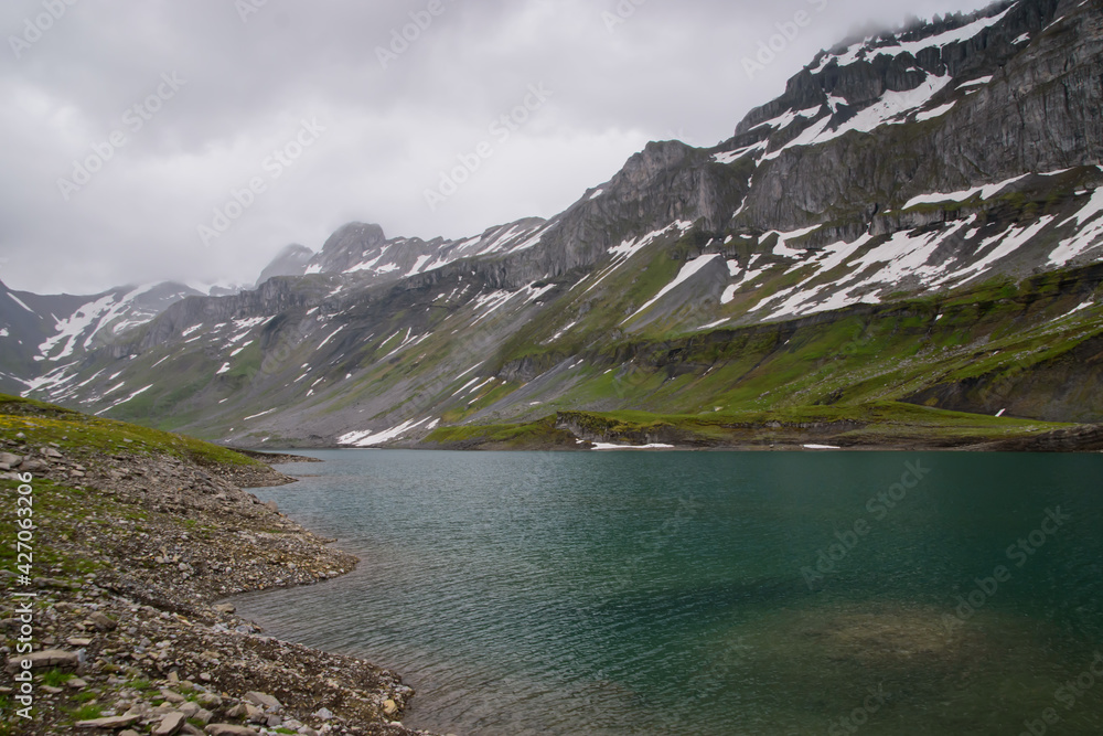 Beautiful swiss alps in summer with Glattalp lake.