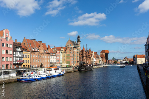  Passenger harbor on the Motława River and a cruise ship at Dlugie Pobrzeze in old town of Gdansk