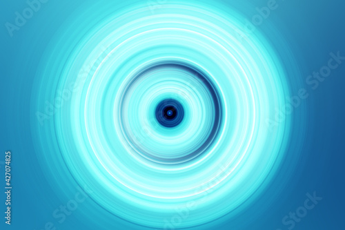Abstract Radial Motion Blur on a blue Background. Circle glowing   pattern for label  textiles  garment or brochure design. Background for modern graphic design and text.   