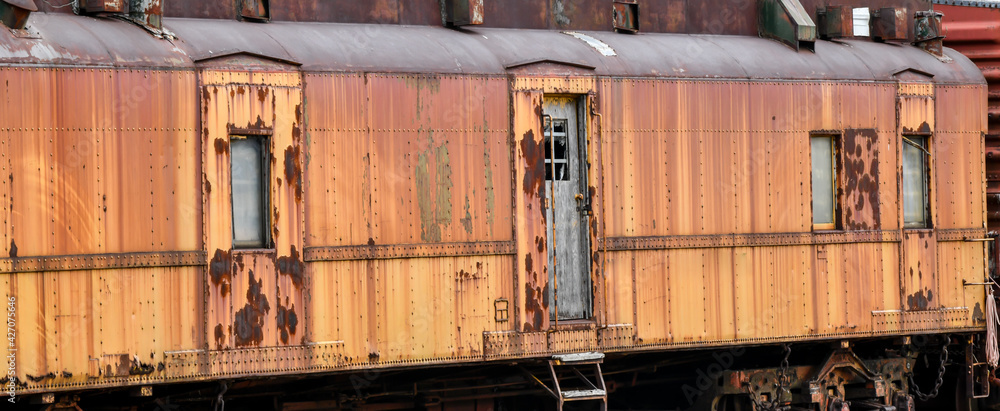Vintage rusty metal abandoned railroad cars