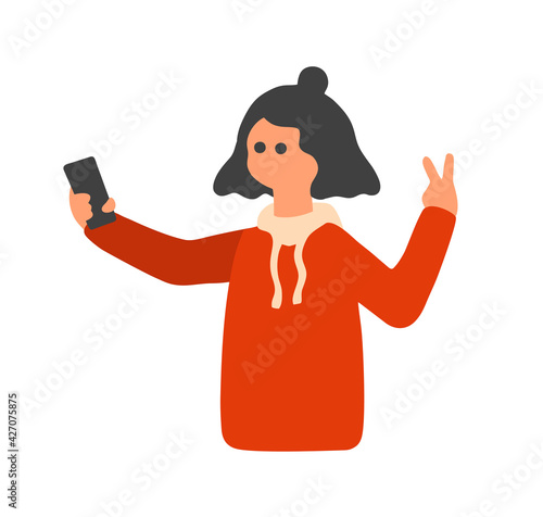 Young pretty girl making selfy photo on smartphone.