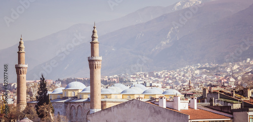 Bursa Grand Mosque and Uludag mountain landscape view. 