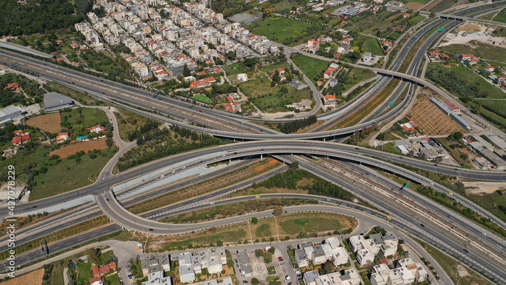 Aerial drone photo of multilevel highway junction toll road of Attiki Odos connecting Attica to Athens International Airport of Eleftherios Venizelos, Attica, Greece Aerial drone photo of multilevel highway junction toll road of Attiki Odos connecting Attica to Athens International Airport of Eleftherios Venizelos, Attica, Greece
