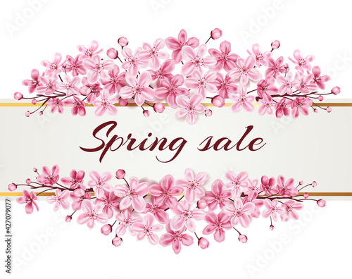 Spring sale background with pink cherry branch