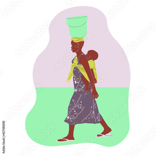 Kenyan Woman with a bucket of fish