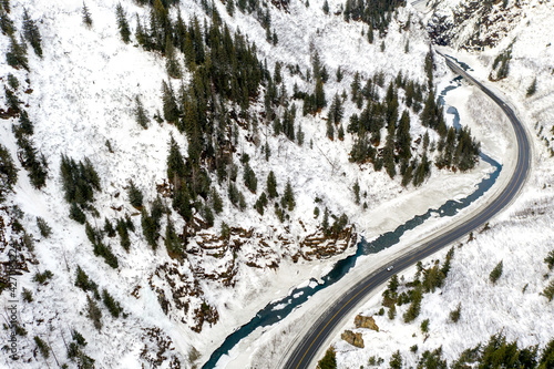 Aerial view of the Richardson Highway, Keystone Canyon, and Lowe River near Valdez, Alaska during the winter.