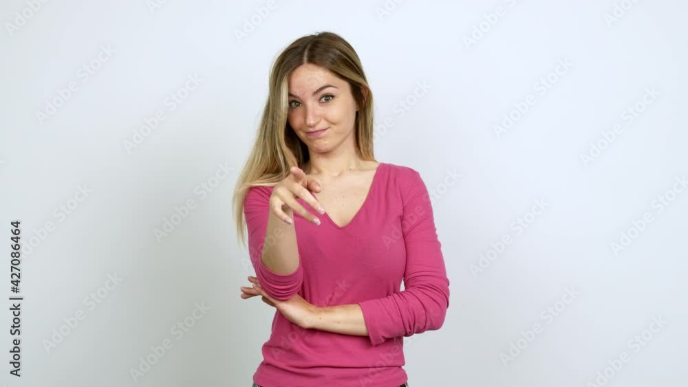 Young woman looking front over isolated background Young woman looking front over isolated background