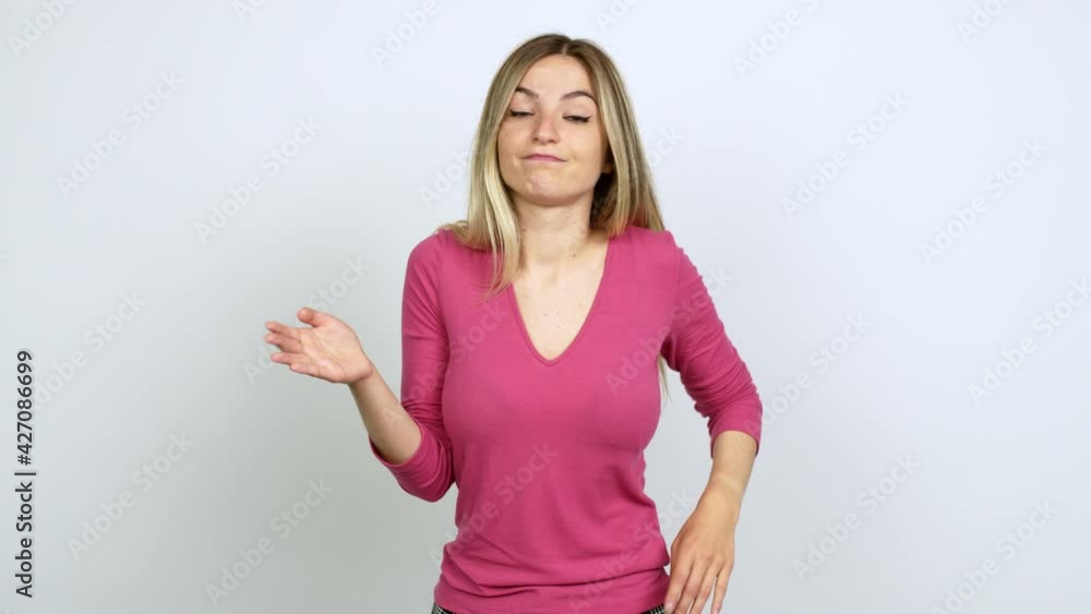 Young woman having doubts over isolated background Young woman having doubts over isolated background