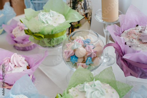 Beautiful Easter cakes on a decorated light table. A light holiday of Easter.