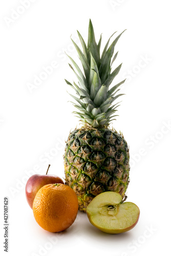 Fresh pineapple  apple and orange isolated on white