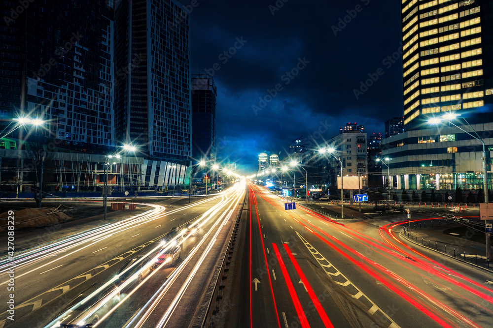 Light traffic trails on the road. Light traffic trails on the road.