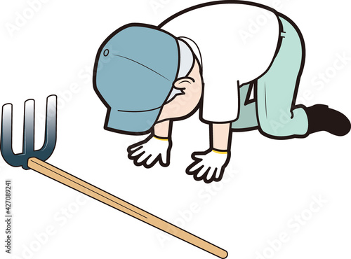 挫折する農家男性