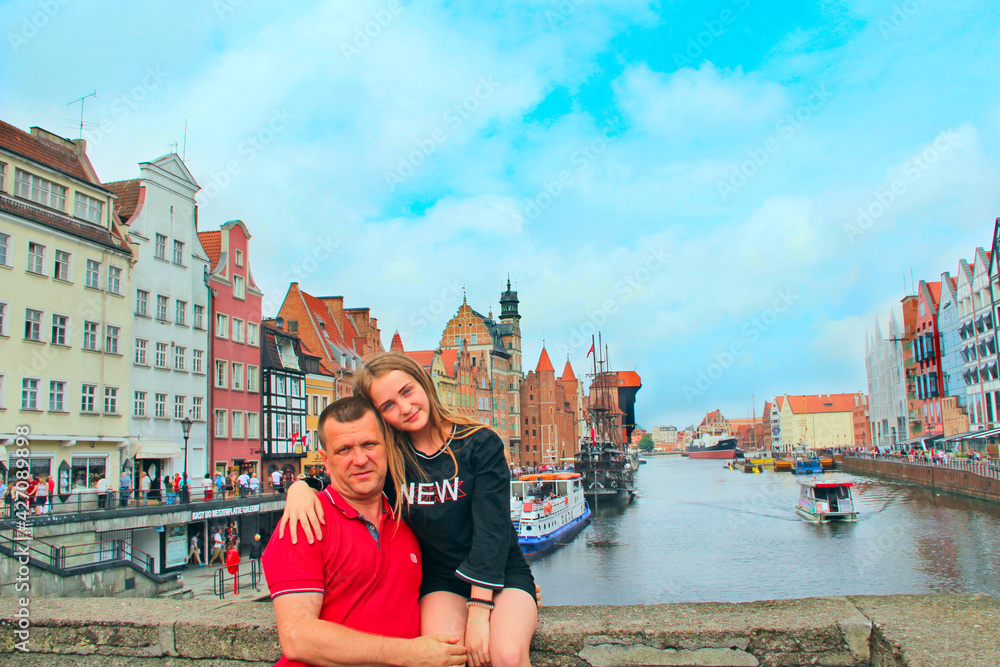 Happy dad and daughter enjoy life. Family vacation in Polish Gdansk