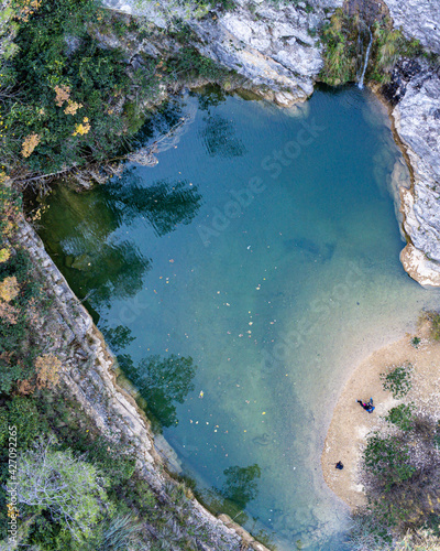 drone view of some natural pools in the rocks in Quesa, located in Valencia, Spain