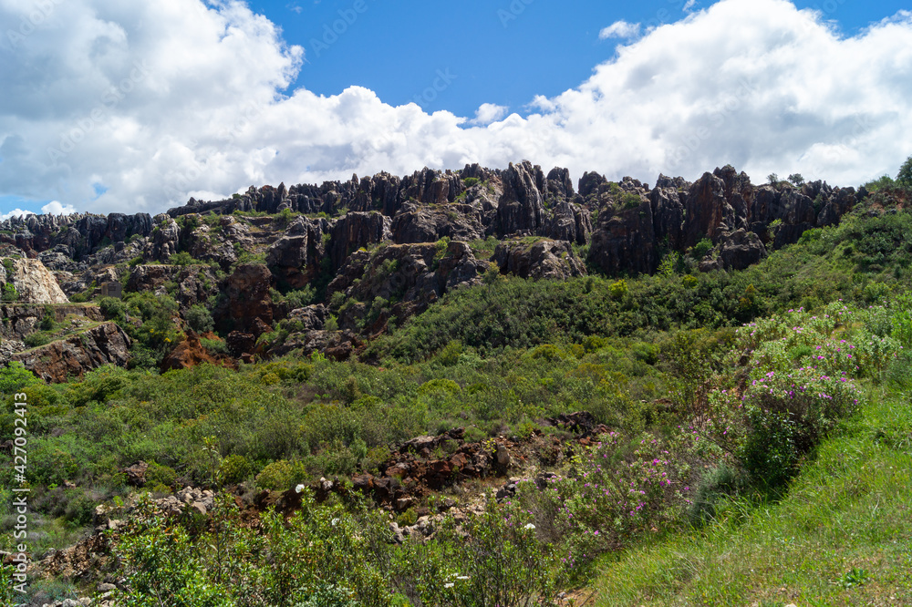 Karst landscape of an old mining area converted to a natural monument called Cerro del Hierro. Limestone rock mountains in the Sierra Norte de Sevilla Natural Park (San Nicolas del Puerto, Spain).
