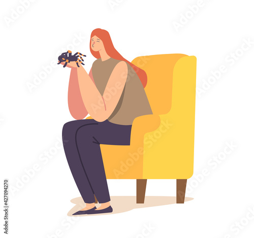 People and Exotic Pets Concept. Female Character Holding Tarantula Spider in Hands Sitting at Home on Armchair