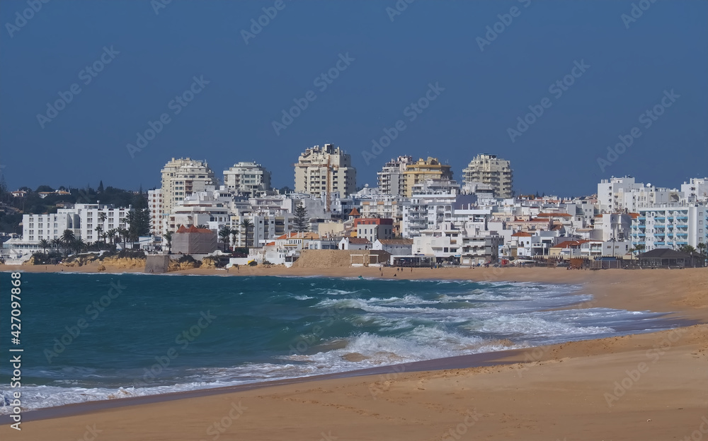 Beuatiful skyline of Armacaou de Pera with dunes in Portugal Beuatiful skyline of Armacaou de Pera with dunes in Portugal