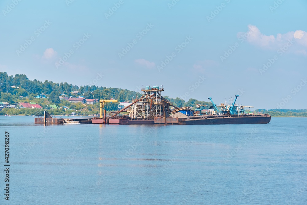 floating sand mining plant - dredger and separator - on the river floating sand mining plant - dredger and separator - on the river