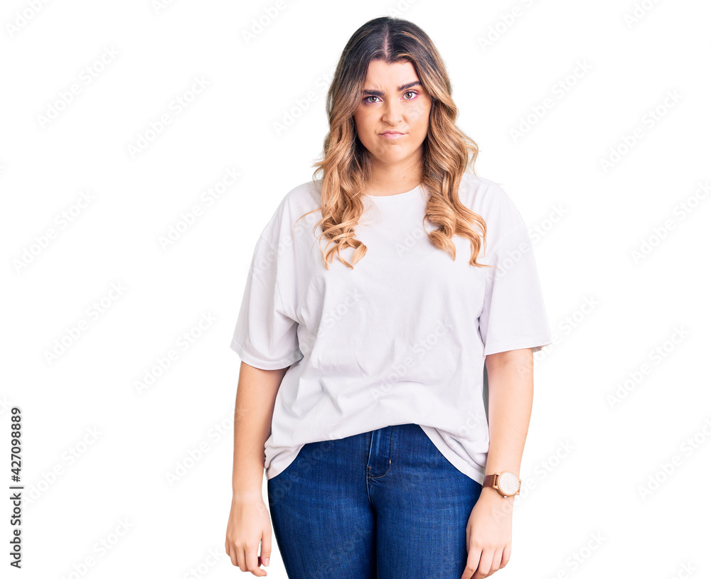 Young caucasian woman wearing casual clothes looking sleepy and tired, exhausted for fatigue and hangover, lazy eyes in the morning. Young caucasian woman wearing casual clothes looking sleepy and tired, exhausted for fatigue and hangover, lazy eyes in the morning.
