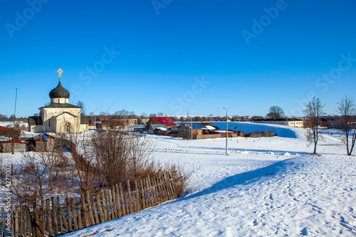 Remains of the shaft of the Yuryev-Polsky Kremlin of the XII century with a view of the St. George Cathedral. Yuryev-Polsky. Vladimir region. Russia