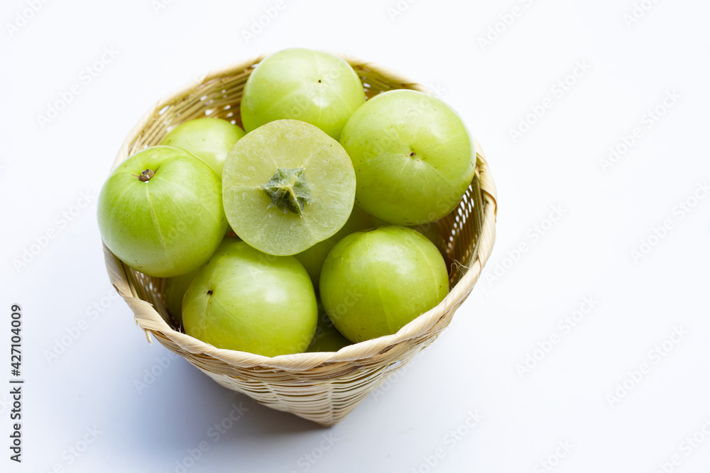 Fresh emblica on a white background. Fresh emblica on a white background.