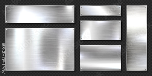 Realistic shiny metal banners set. Brushed steel plate with screws. Polished silver metal surface. Vector illustration.