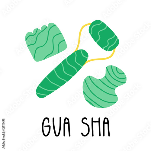 Various gua sha or jade crystal scraper, face roller, massager. Self-care, facial anti-aging and body care spa tools.