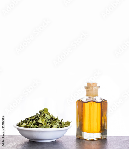 Fototapeta Naklejka Na Ścianę i Meble -  Moringa oil and organic leaves - Healthy food