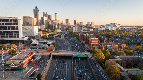 Epic aerial view over Interstate-85 leading to downtown Atlanta, Georgia skyline.