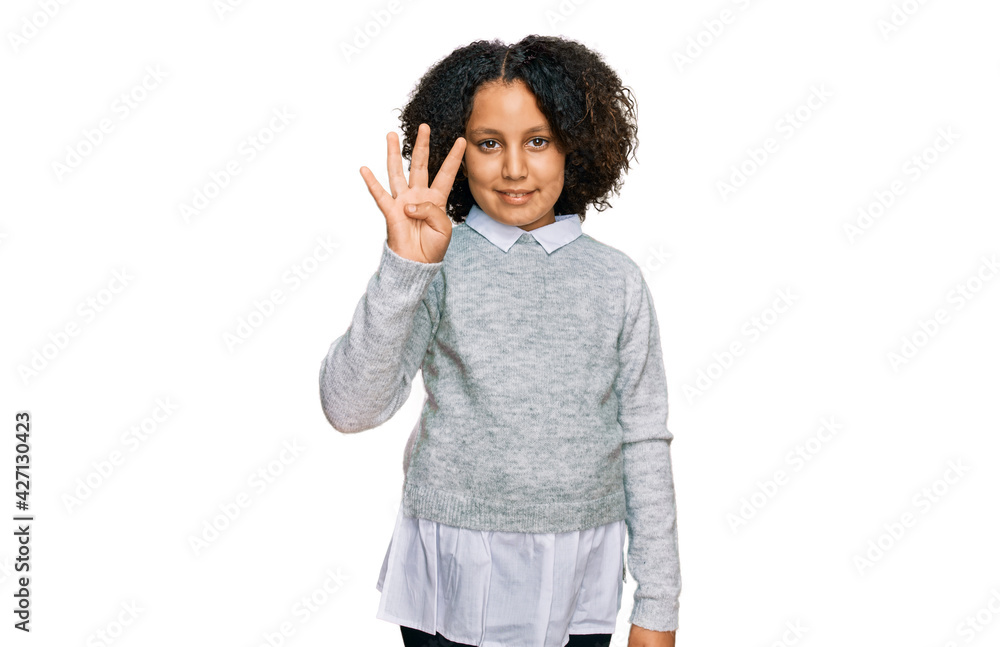 Young little girl with afro hair wearing casual clothes showing and pointing up with fingers number four while smiling confident and happy. Young little girl with afro hair wearing casual clothes showing and pointing up with fingers number four while smiling confident and happy.