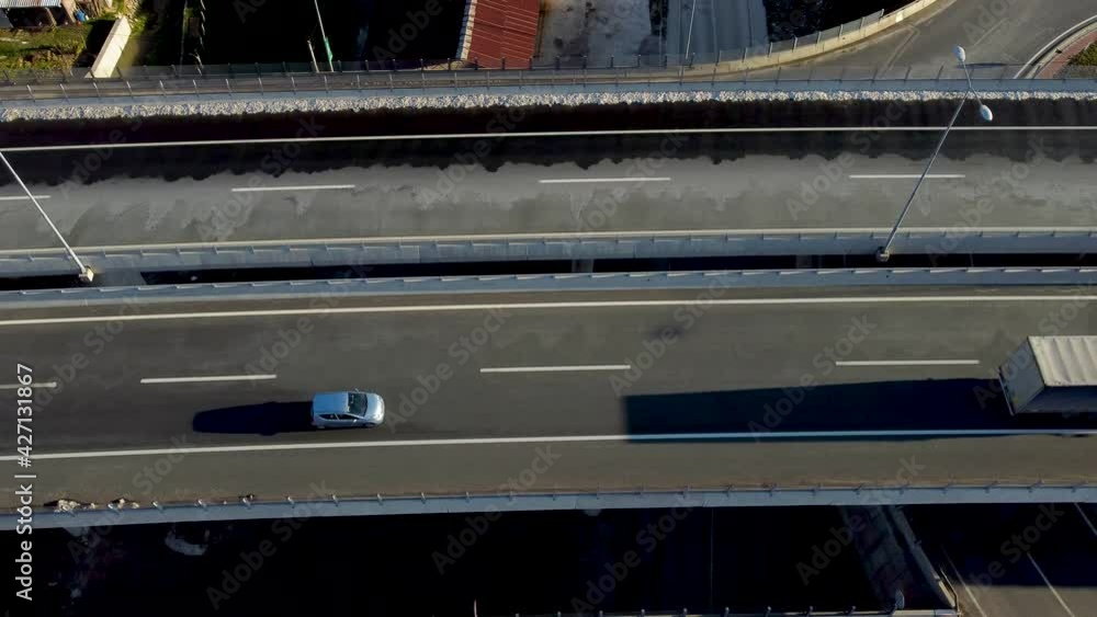 Aerial drone view of highway. Cars and trucks moving fast. Transportation. Aerial drone view of highway. Cars and trucks moving fast. Transportation.