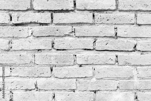 Vintage white brick tile wall pattern and background seamless