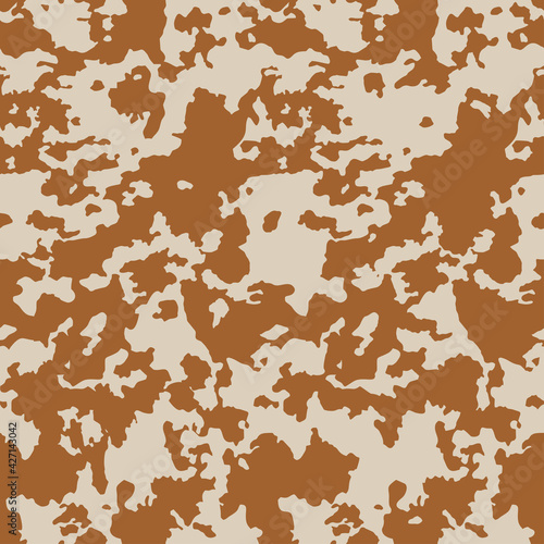 Cow skin in brown and beige spotted, seamless pattern for print, animal texture. Vector wallpaper 