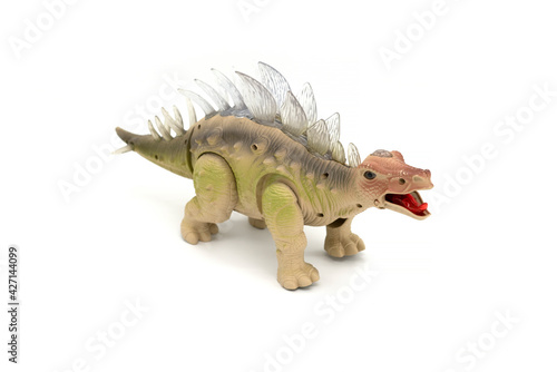 Plastic dinosaur toy isolated on white background